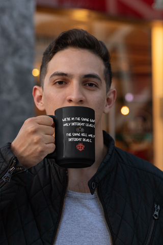 We're in the same game only different levels. Same hell only different devils 11oz Black Mug